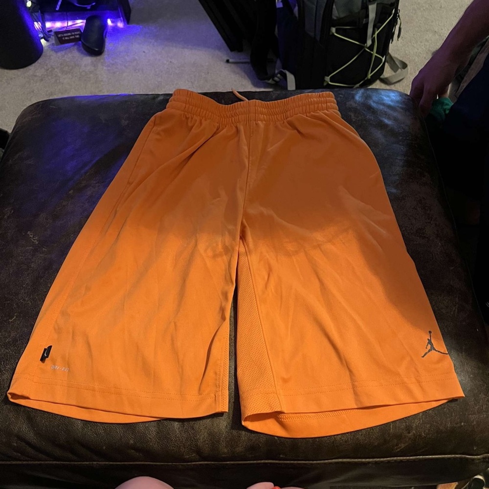 Boys orange Jordan shorts
